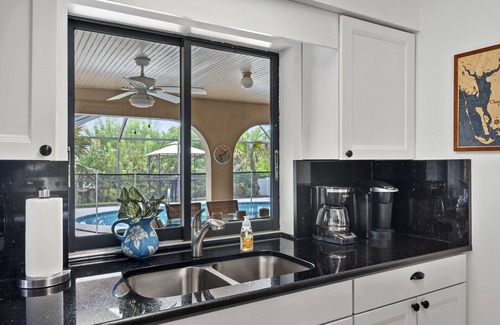 Port Charlotte House | CANAL HOME! WARM PRIVATE POOL! FAMILY MEMORIES! WIFI! GRILL! BABY SUPPLIES!