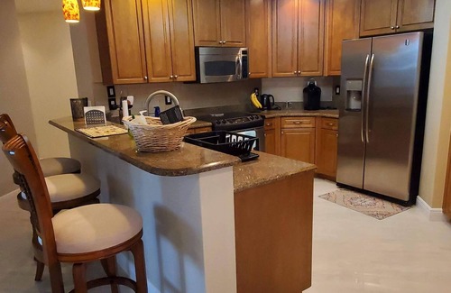 Cape Harbour Condo | Cape Coral, Cape Harbour Condo w/beautiful views & 2 screened lanais, new reno.