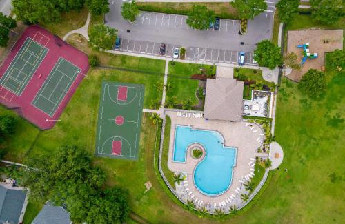 Sabal Harbour House | Cappy Hour! Lakefront townhome with backyard paradise and amazing community amenities!