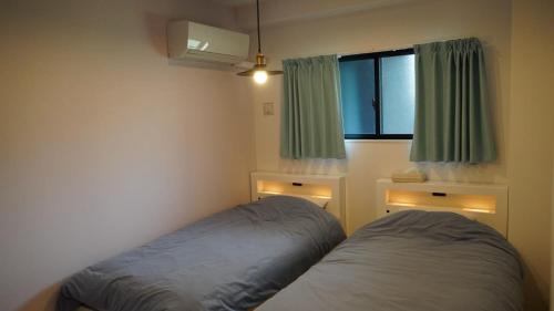 Sakimotobu Apartment | Captain Kangaroo Condo - Vacation STAY 88633v