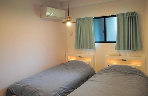 Sakimotobu Apartment | Captain Kangaroo Condo - Vacation STAY 62933v