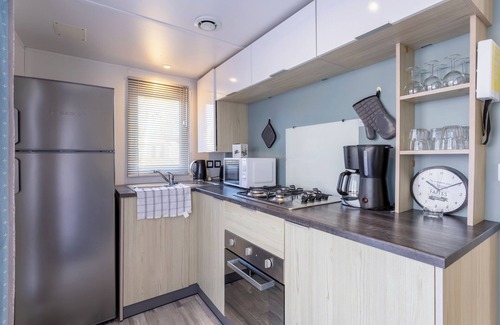 Pont-Aven RV Rental | Caravan 'Sur Pont-Aven' with Private Terrace, Private Garden and Wi-Fi