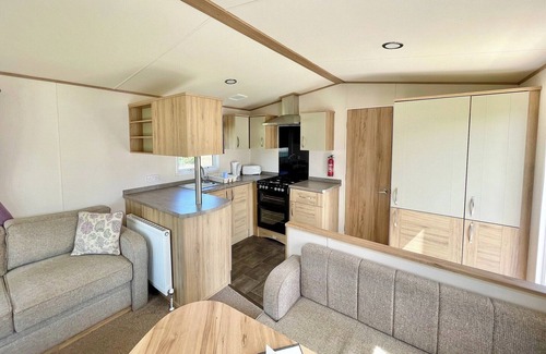 Alford House | Caravan with one double and one twin.