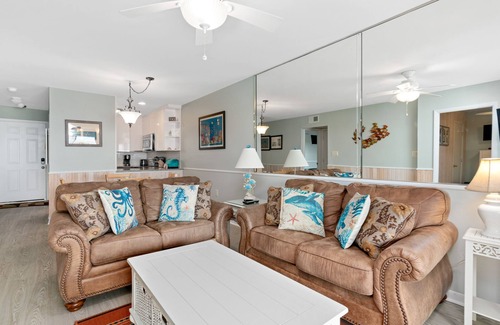 Caswell Beach Condo | Carefree: Oceanfront Condo with Private Balcony and Seasonal Community Pool