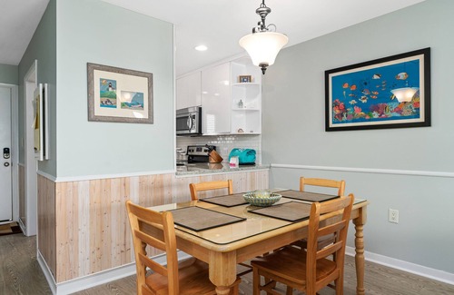 Caswell Beach Condo | Carefree: Oceanfront Condo with Private Balcony and Seasonal Community Pool