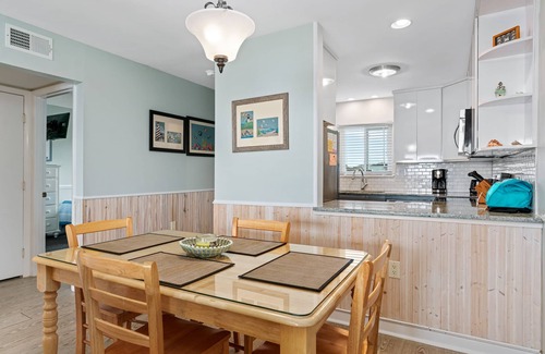 Caswell Beach Condo | Carefree: Oceanfront Condo with Private Balcony and Seasonal Community Pool
