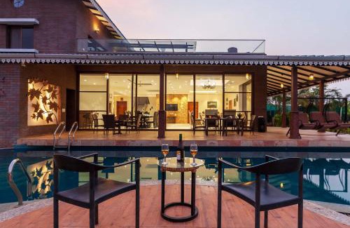 Nashik Villa | Casa del Verde by StayVista - Orchards oasis with a pool, Spacious lawn, Terrace & Indoor games