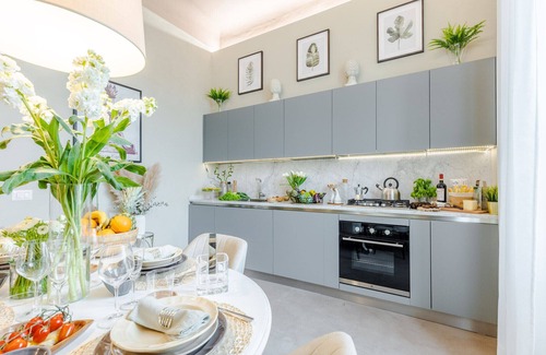 Lucca Historical Center Apartment | Casa Gina, a modern charming urban retreat with free parking by the train station and the Walls of Lucca