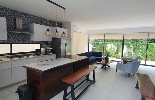 Puerto Morelos House | Casa Luz. At the heart of the jungle 10 min from white sandy beach. Book now!