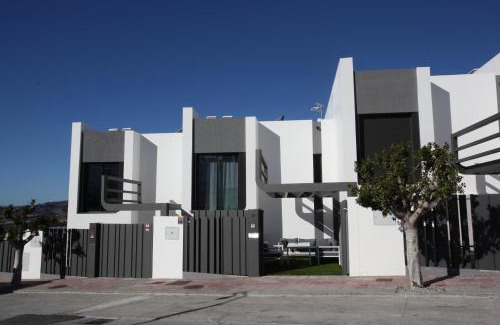 Caleta de Velez House | Casa Melocotón - Designhouse mit privatem Pool, direkt am Golfplatz