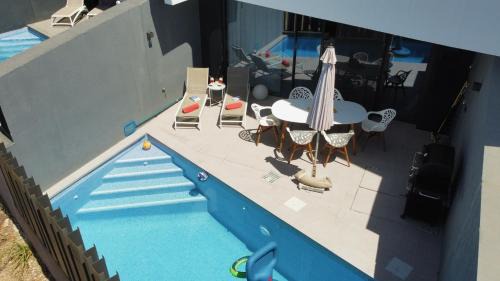 Caleta de Velez House | Casa Melocotón - Designhouse mit privatem Pool, direkt am Golfplatz