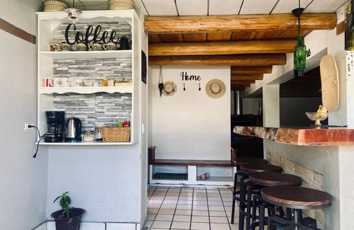Creel Cabin | Casa MiRó Creel, a cozy place with an indoor fireplace.