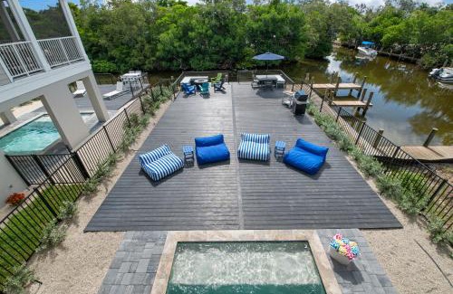 Cortez House | CASA NICA! Luxury Private Pool Home with dock on a saltwater canal!