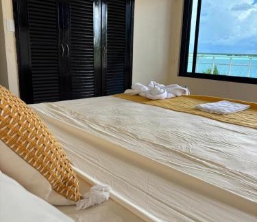 Chetumal House | Casa Sirena - Habitaciones a orilla de la Laguna y Cenote Esmeralda