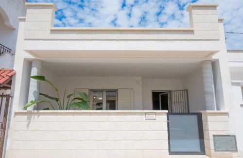 Sant'Isidoro Apartment | Casa Vacanza 200m dalla spiaggia - Acquamarina