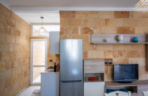Sant'Isidoro Apartment | Casa Vacanza 200m dalla spiaggia - Acquamarina