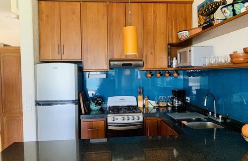 Puerto Morelos Condo | Casita Blanca gem overlooking a gorgeous pool and the Caribbean Sea!