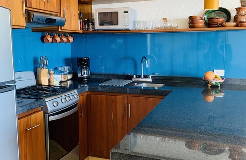 Puerto Morelos Condo | Casita Blanca gem overlooking a gorgeous pool and the Caribbean Sea!