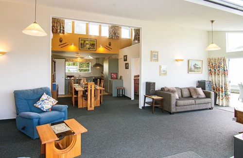 Castlepoint House | Castlepoint - Private family beach home with stunning views capturing the sun.