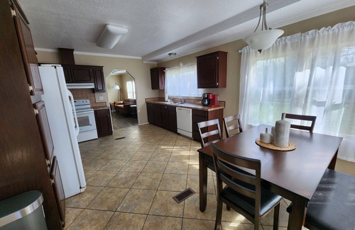 Tyler House | Cattlemens Quarters beautiful ranch setting with fenced yards and a great deck!