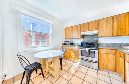 Garden District Condo | CDA Loft & Rooftop Near the Action