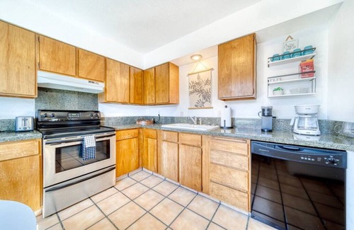 Garden District Condo | CDA Loft & Rooftop Near the Action