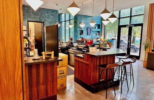 Westside Apartment | Ceiling to floor windows featuring a private balcony with stunning city views! n