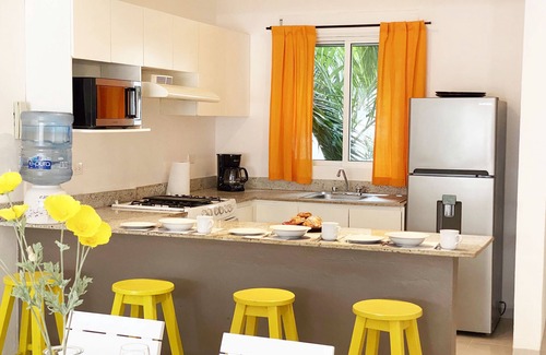 Zazil-ha Condo | Central 2BR, 1 Block to Beach, Large Private Roof, Pool, Parking, Rooftop Pool