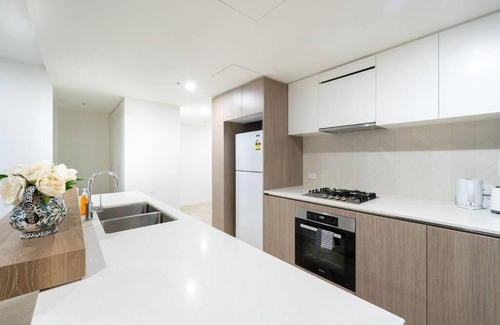 Eagle Farm Apartment | Central 2BR-2BA Resort-Style Retreat In Hamilton - H20705