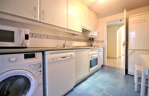 Nueva Andalucia Apartment | Central apartment with pool, air-con and Wifi, Short walk to Puerto Banus shops, bars & cafes