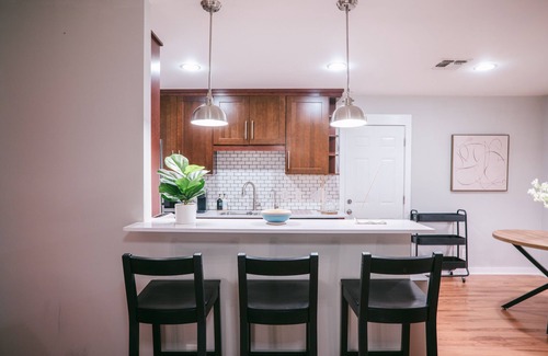 East MLK House | Central East Austin Fun Home with Sand Court + Games
