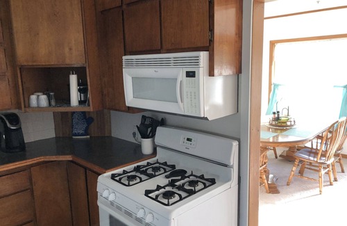 Tawas City House | Central located. Includes finished 2 car garage! 1 minute from beach!