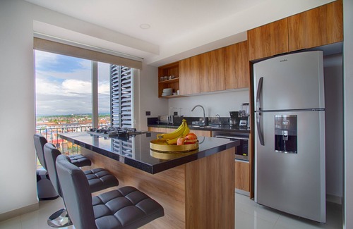 North Hotel Zone Condo | Central Location, Superb Family Amenities, Parking