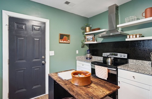 North Charleston House | Central pup-friendly ranch with vibrant interior, cozy deck & fenced backyard