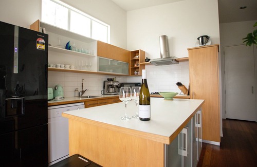 Raglan House | Central Raglan Stylish Retreat with Sea Views
