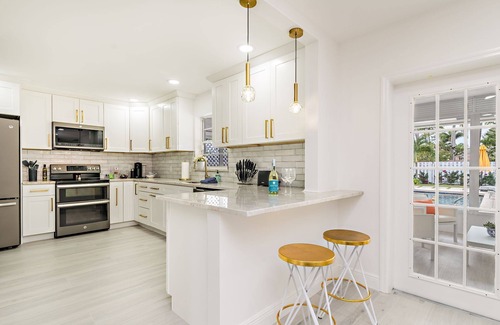 Parrot Cove House | Centrally located luxe poolside oasis w/standout amenities!