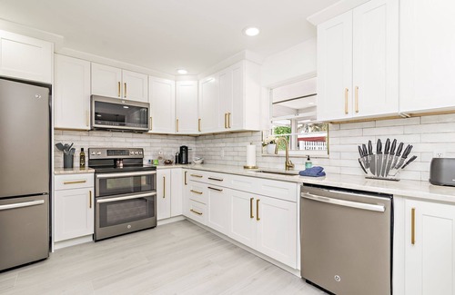 Parrot Cove House | Centrally located luxe poolside oasis w/standout amenities!