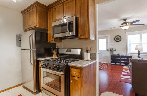 Mid City Cottage | Centrally located! 15 min. to beach, outdoor patio & pet friendly!