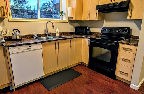 Saanich East House | Centrally located basement suite near the University