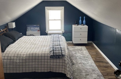 Negaunee House | Centrally located home with space inside & out!
