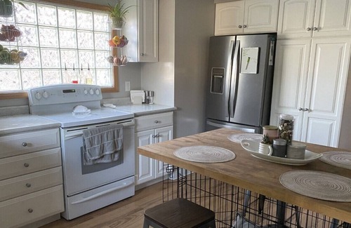 Negaunee House | Centrally located home with space inside & out!