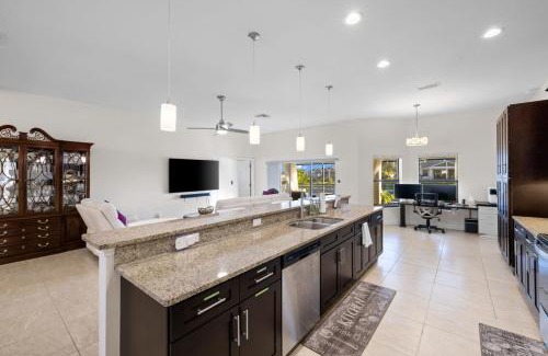 Pelican House | Centrally Located - Waterfront Pool Home Convenient Location