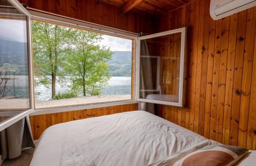 Tenna Ski Chalet | Chalet Alessandrini - Private Lakeside Beach