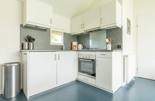 Westenschouwen House | Chalet Aurora; elegantly and comfortably furnished, including a wood-burning stove!