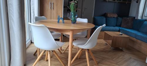 Lauwersoog Ski Chalet | Chalet Aventura 1-6 pers- 3 slaapk- 2 badk- Berging- Inchecken al vanaf 13 uur