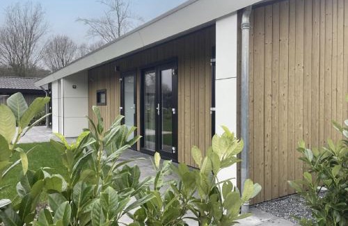 Municipality of Veldhoven Ski Chalet | Chalet by Park Pond in the Netherlands