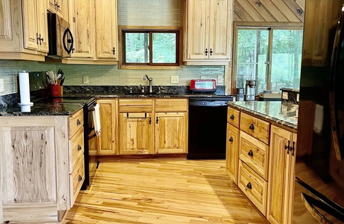 Fife Lake Ski Chalet | Chalet on Manistee River with amazing backyard pond. 5 minutes from Fife Lake.