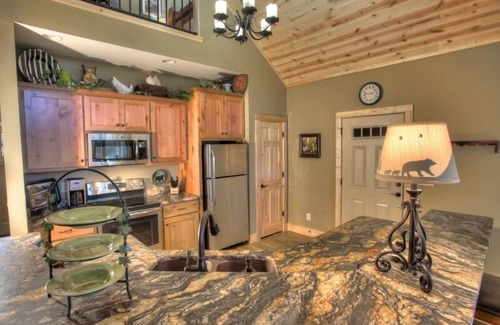 Helen House | Chalet on the Green | Luxury Innsbruck Home w/Covered Deck and Hot Tub in Helen