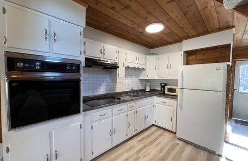 Stevensville House | Chalet on the Lake 65 w/Beach Access, Pools, Sport Courts, Fishing Pond & more!