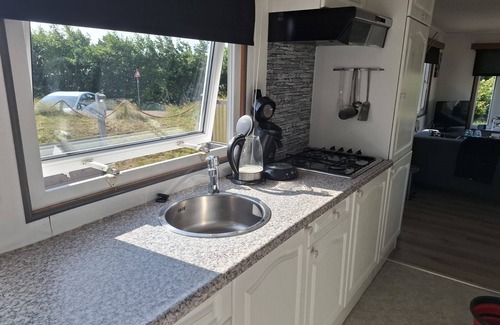 Buren Ski Chalet | Chalet T12 inclusief Fietsen. Zee en Strand op loopafstand!